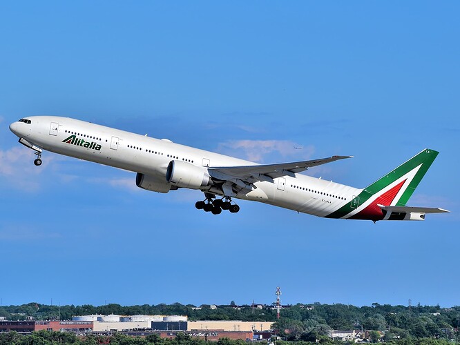 Alitalia_Boeing_777-3Q8(ER)_EI-WLA_departing_JFK_Airport
