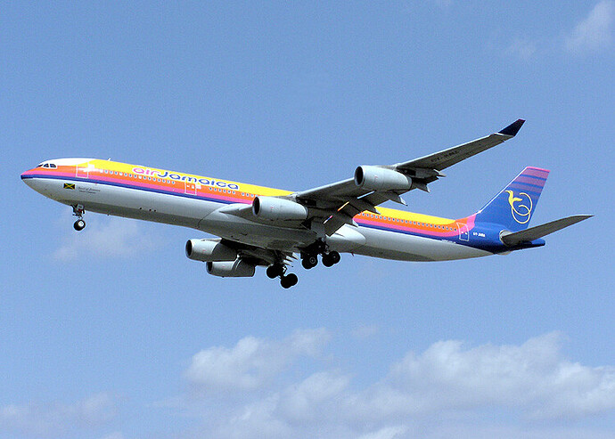 Air_Jamaica_A340-313_(6Y-JMM)landing_at_London_Heathrow_Airport(2)