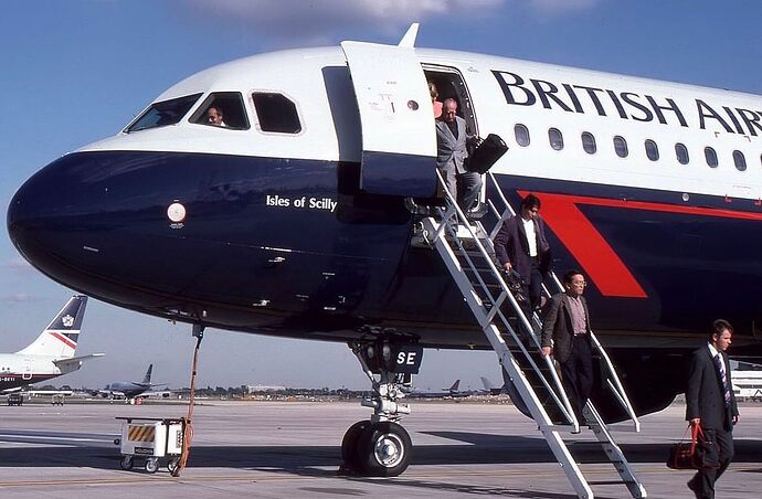 British Airways Airbus A320-100 G-BUSE with retractable air stairs. Great angle!